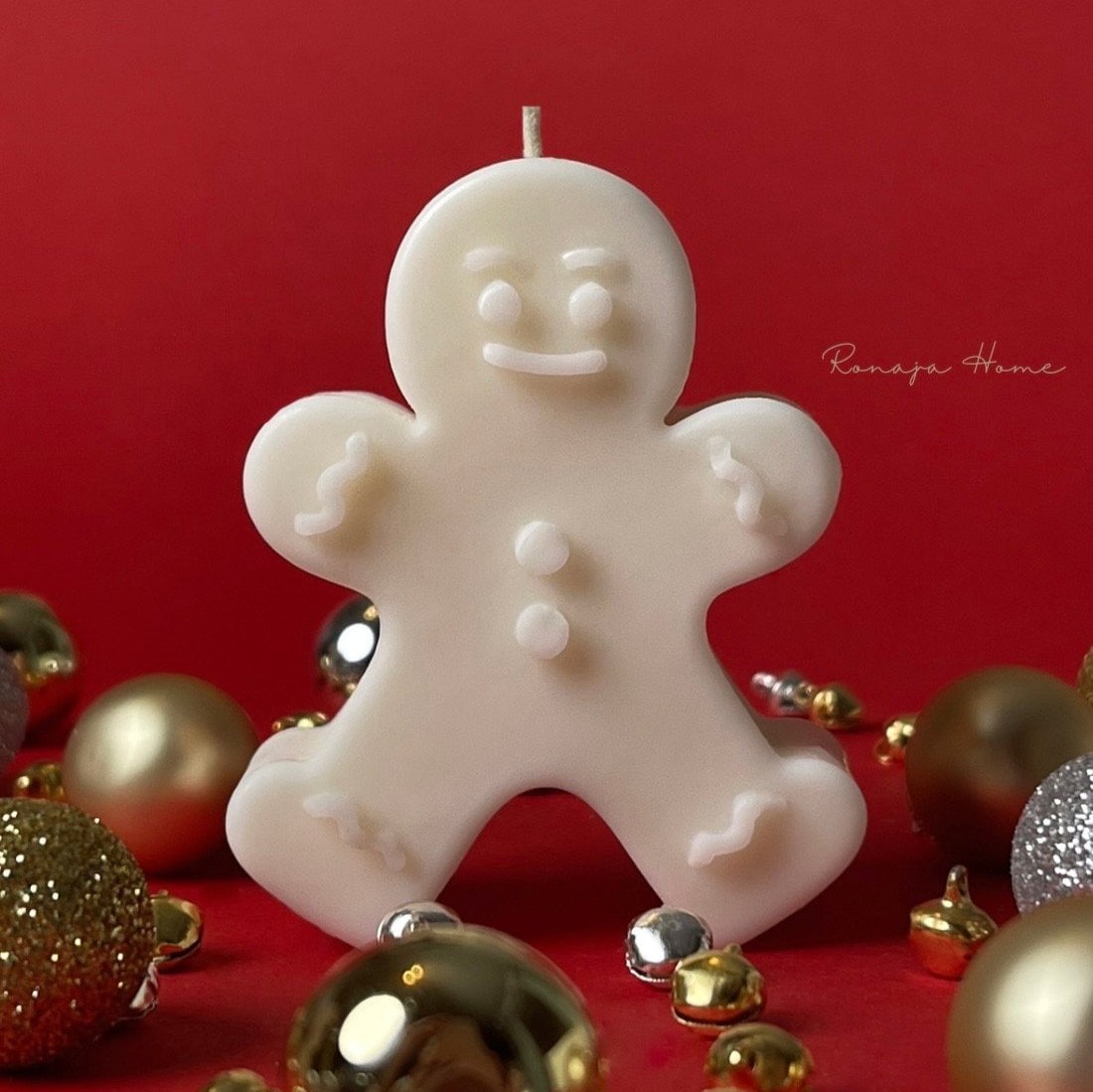 Piccola candela a forma di omino di pan di zenzero