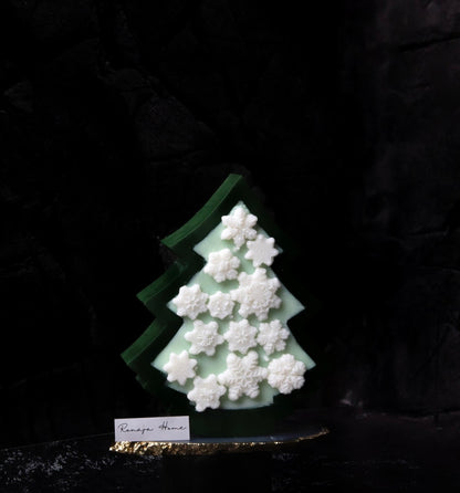 Weihnachtsbaum mit Schneeflocken Kerze