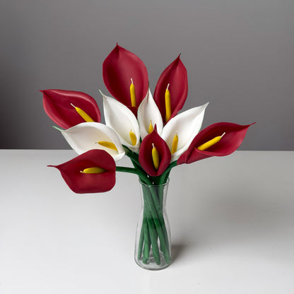 Bouquet of red and white calla lily candles in a clear vase - perfect gift